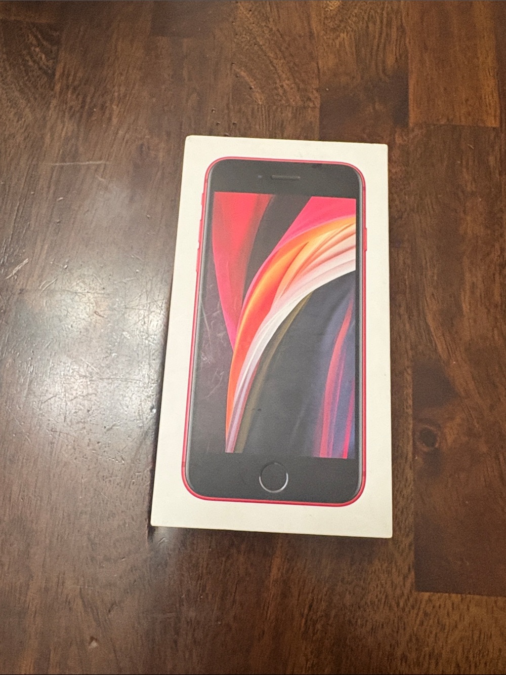 Apple iPhone SE in Red - Compact Touch ID Smartphone, Tiny crack in back.